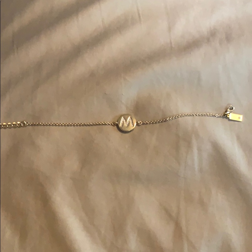 Women’s “M” Kate spade gold bracelet